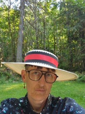 Straw Boater Hat with Red and Black Band With Bow At Back